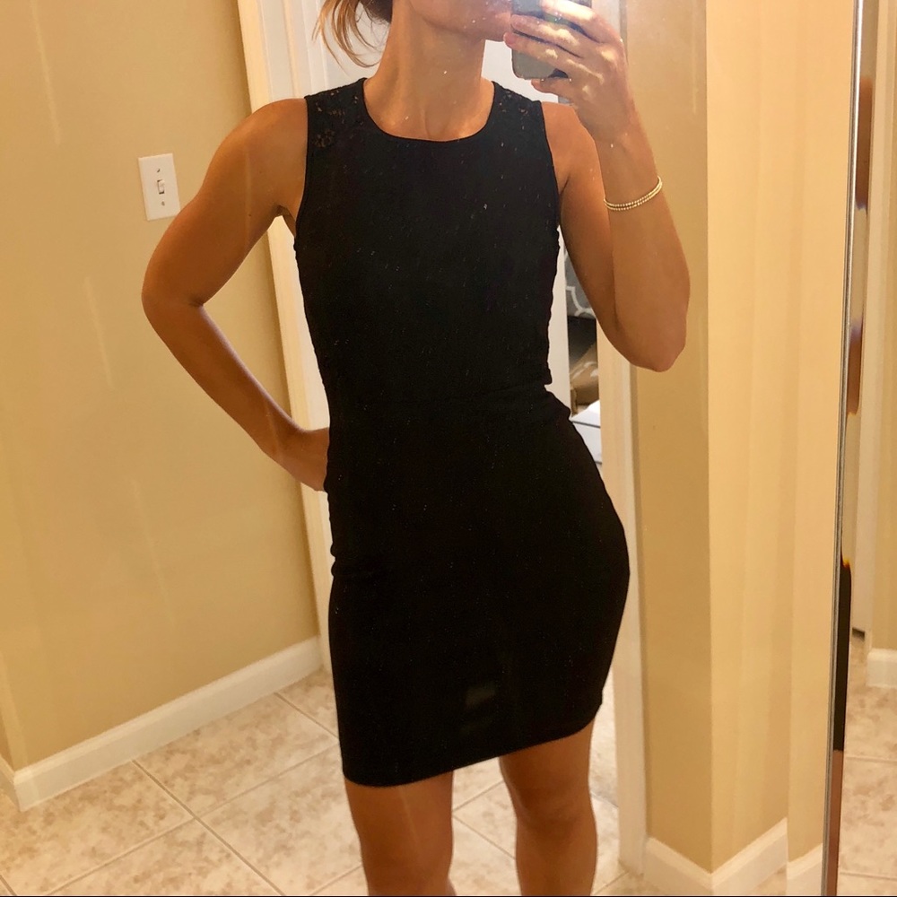 H&M stretchy minidress with lace design back in XS